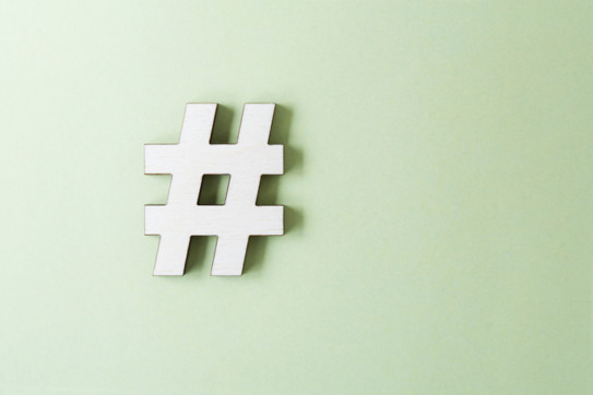 a hashtag on a simple, light green background